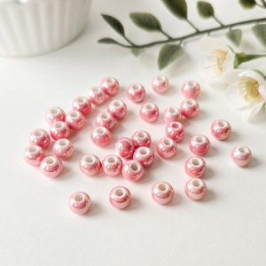 Porselensperler, runde, rosa ab, 7mm